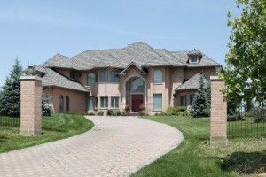 10293090-luxury-brick-home-with-pillars-and-arched-entry