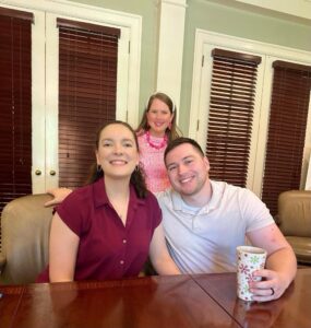 Happy real estate closing with Auburn family and trusted realtor Laura Sellers