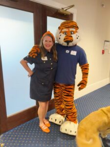 Aubie and Soile the golden retriever at Auburn alumni event