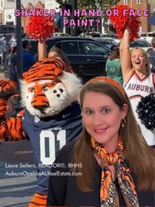 Auburn gameday fan gear with shaker and face paint in orange and blue
