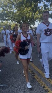 Auburn cheerleaders leading fans at Tiger Walk