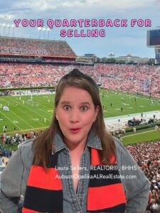 Auburn REALTOR® Laura Sellers guiding home sellers like a quarterback calling a play.