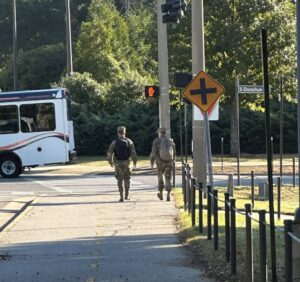 Auburn University ROTC cadets running at sunrise near Jordan-Hare Stadium in Auburn, Alabama.