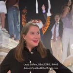 Aubie the Tiger and the Auburn cheer squad with fans at Jordan-Hare Stadium.