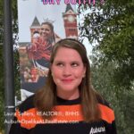 Auburn fans wearing orange and blue outfits on game day near Jordan-Hare Stadium.