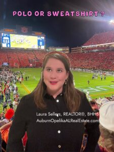 Auburn fan deciding between an orange polo and a vintage Auburn sweatshirt