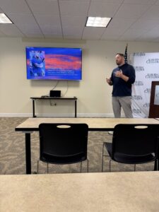 Coach Robb Taylor speaking at Auburn Adapted Athletics Tuesday Talk