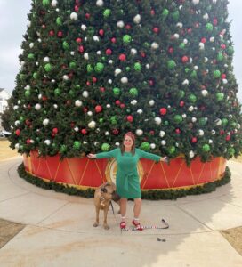 Families enjoying Christmas in a Railroad Town in Historic Downtown Opelika at night.