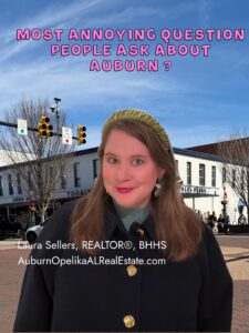 Downtown Auburn street with Toomer’s Corner and Auburn University sign.