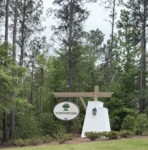 Northwoods neighborhood in Auburn Alabama featuring mature trees, quiet streets, and homes near Auburn University