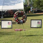 Auburn University Memorial Day observance on Cater Lawn with American flags