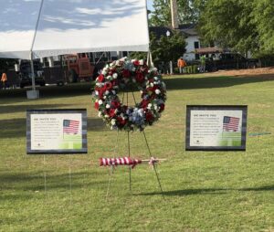 Auburn University Memorial Day observance on Cater Lawn with American flags