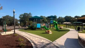 Opelika Floral Park in Opelika Alabama featuring the inclusive playground, dog park, athletic fields, splash pad and family recreation areas.