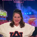 Moving to Auburn and waving an orange shaker at an Auburn football game
