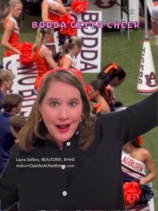 Bodda Getta Auburn cheer during an Auburn football game